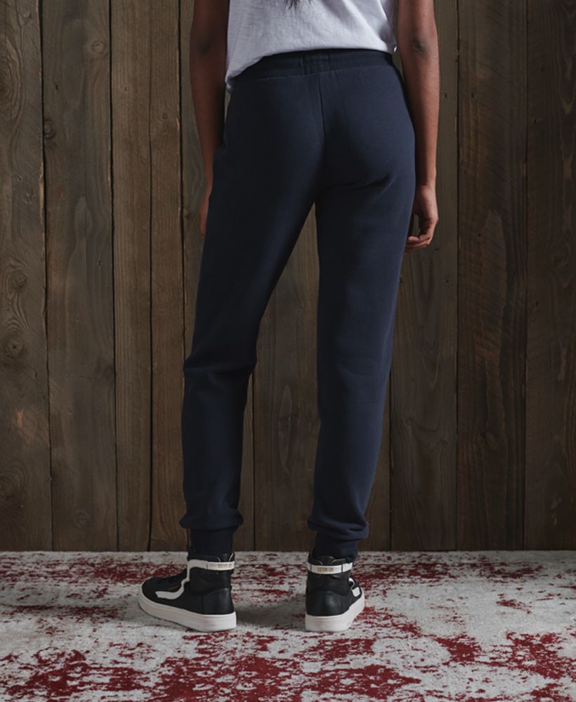 Nothing says vintage more than our classic sportswear pieces. Get that iconic sporty look with these Track & Field Classic Joggers that have the added bonus of a fleece lining to keep you look good and feeling comfortable.Slim fit – designed to fit closer to the body for a more tailored lookElasticated drawstring waistTwo pocketsFleece liningRibbed cuffsCracked effect print