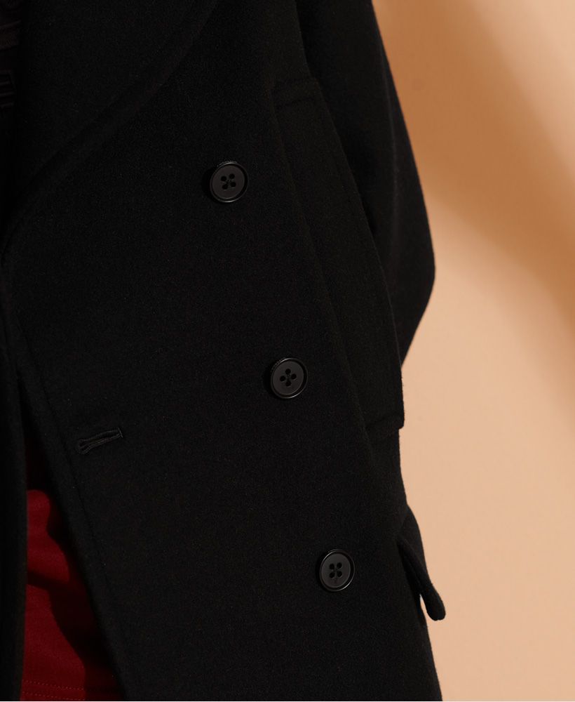 An all round sophisticated and simple coat, ideal for those important or special occasion. The Wool Pea Coat is beautifully crafted and exudes premium quality.Button fasteningTwo pocketsTwo faux pocketsNotch lapelSignature logo patchSignature logo badge
