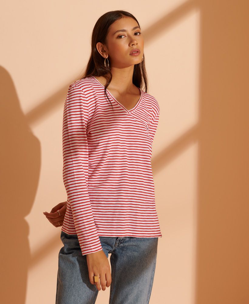 A classic long sleeved top with a v-neck and stylish stripes to elevate your wardrobe. Made with over 50% Organic Cotton.V-NeckLong sleevesChest pocketStriped designEmbroidered logoSignature logo tabMade using a blend of Organic Cotton and TENCEL™.Organic Cotton is grown without the use of artificial chemicals, leading to healthier soil, less water used, and better health among farmers.Tencel™ Modal fibres are produced by an Eco Soft technology - an environmentally responsible choice.