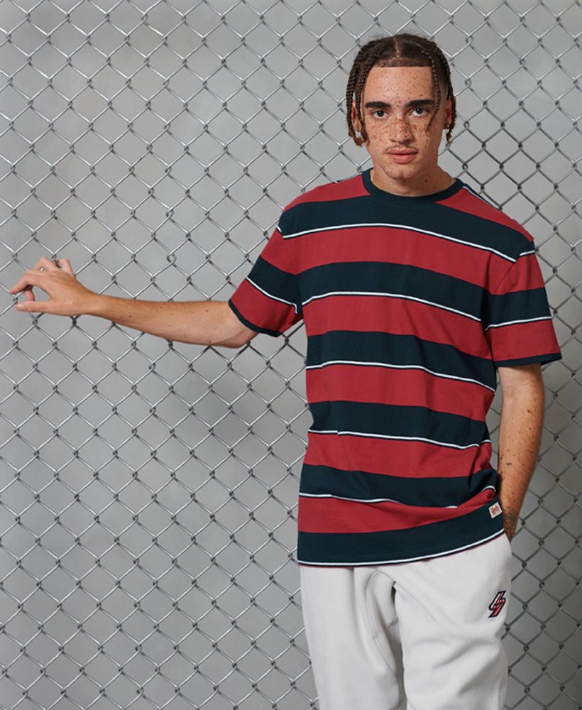 Add a pop of colour to your basics this season with the R&P box fit stripe tee featuring a colour block stripe design. This t-shirt will look great paired with jeans to complete the look.Relaxed fit – the classic Superdry fit. Not too slim, not too loose, just right. Go for your normal sizeClassic ribbed crew necklineShort sleevesStripe designBox fitSignature logo patchMade with Organic Cotton - Made using cotton grown using organic farming methods which minimise water usage and eliminate pesticides, maximising soil health and farmer livelihoods