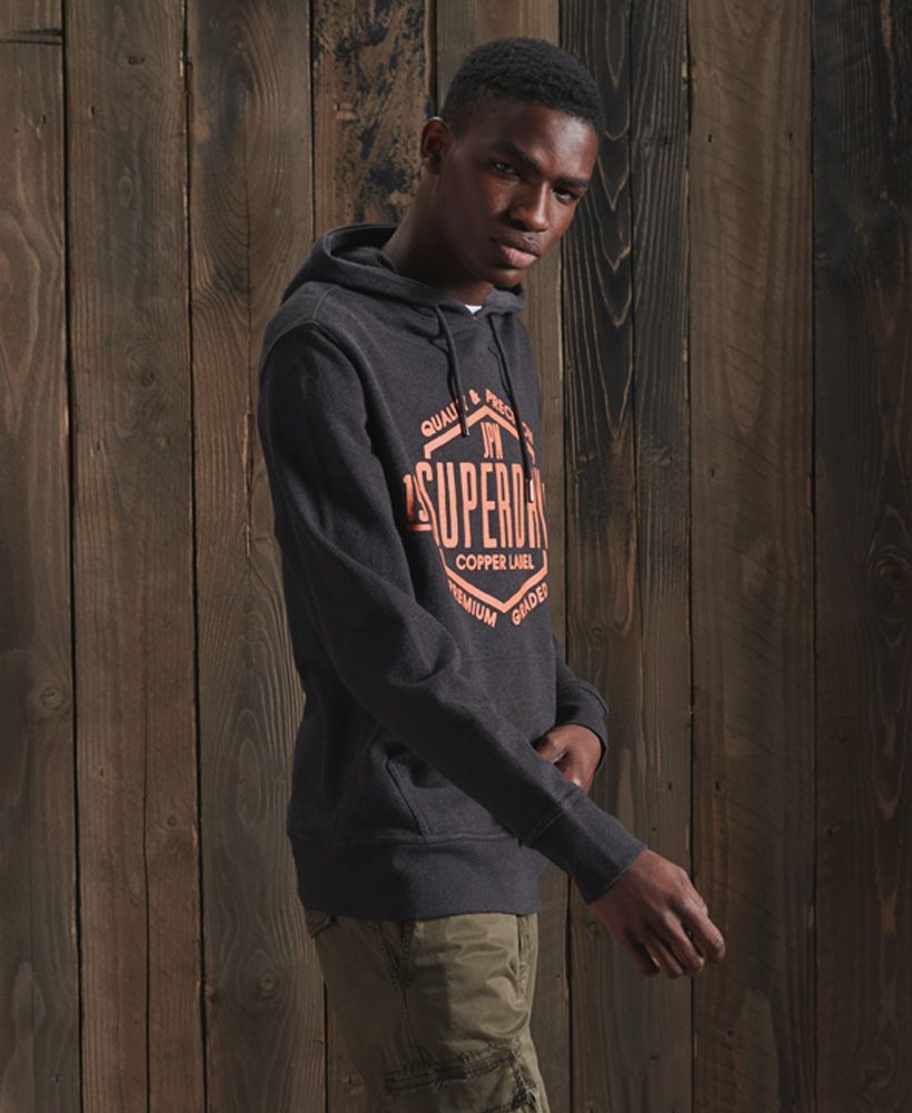 Update your hoodie collection with the Copper Label hoodie, featuring a loopback lining making it the perfect layering piece to keep you warm this season. Complete the look with your favourite jeans and trainers.Slim fit – designed to fit closer to the body for a more tailored lookDrawstring hoodFront pouch pocketRibbed cuffs and hemPrinted Superdry graphicSignature logo patch