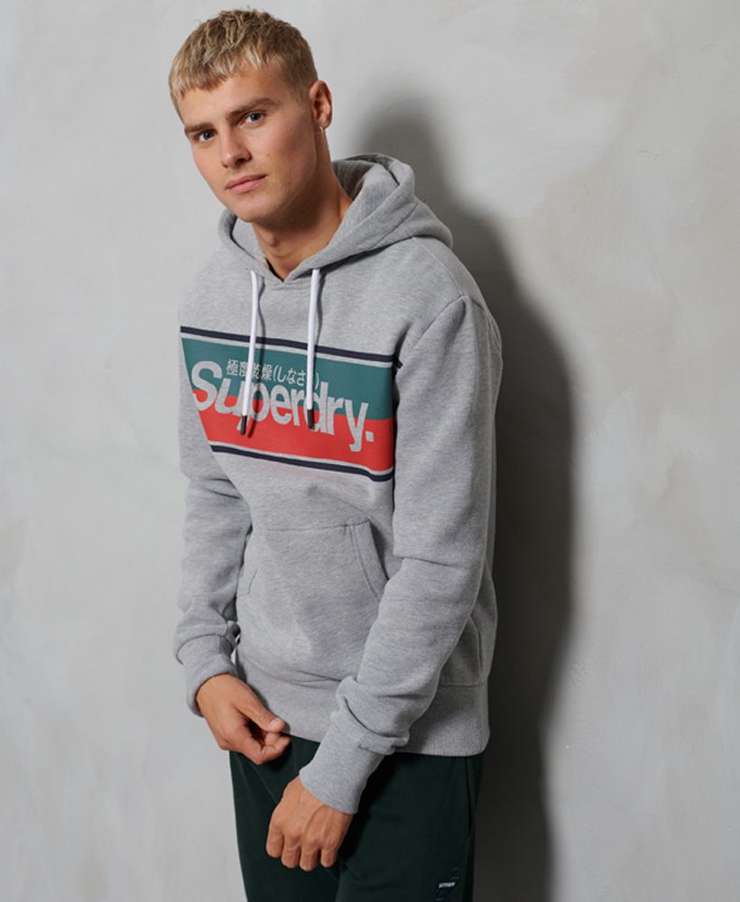 Layer up this season in the Core Stripe hoodie, made from a super-soft cotton blend fabric, featuring a brushed fleece lining throughout. Essential for extra warmth on the chillier days.Slim fit – designed to fit closer to the body for a more tailored lookDrawstring hoodPrinted graphicFront pouch pocketRibbed cuffs and hem