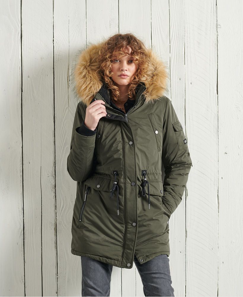 Designed with you in mind this season, the Nadare Microfibre Parka Coat, featuring a recycled polyester padding to keep you warm and cosy on those chilly days. Perfect for layeriong over any outfit to complete your look. Being sustainably friendly never looked so good!Main zip and popper fasteningSeven pocket designSherpa lined hood with removable faux fur trimDrawstring waistbandSuper soft sherpa liningRear ventRibbed cuffsRecycled paddingSignature logo badgeSignature logo patchThe padding in this jacket is 100% Recycled Polyester – each jacket contains up to 10 recycled bottles, this avoids these bottles being sent to landfill or polluting our oceans.