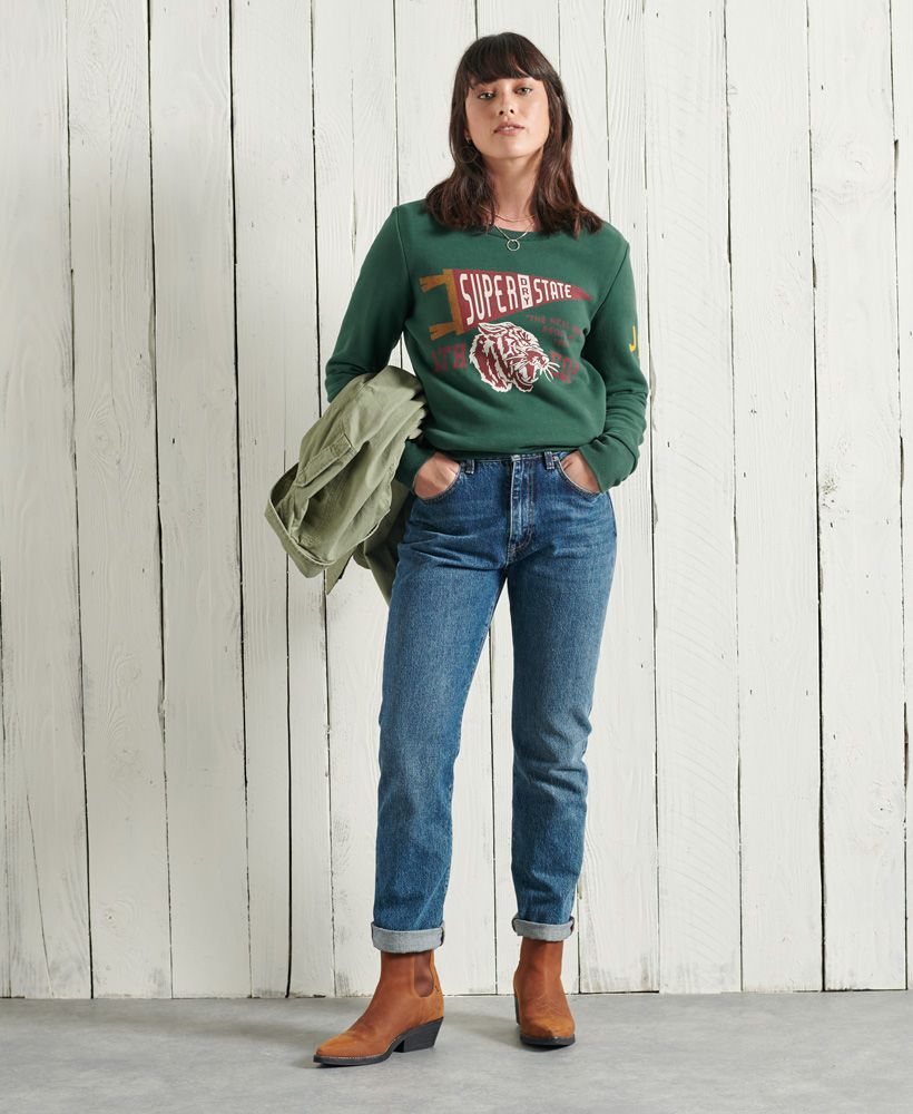 Inspired by athleisure attire, the Track & Field classic crew sweatshirt is perfect for layering over your tee with jeans to create a laid back look this season.Slim fit – designed to fit closer to the body for a more tailored lookClassic crew necklineLong sleevesRibbed neckline, cuffs and hemFleece liningCrack effect detailingSuperdry logo graphicSignature logo tab