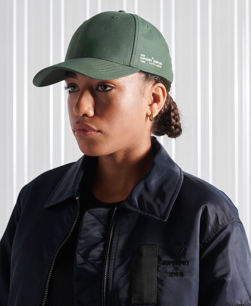 Keeping it simple while still allowing you to show your colours, the Micro Logo baseball cap is a classic that will top off your casual outfit.Curved peakBuckle adjusterVentilation holesSignature logo print