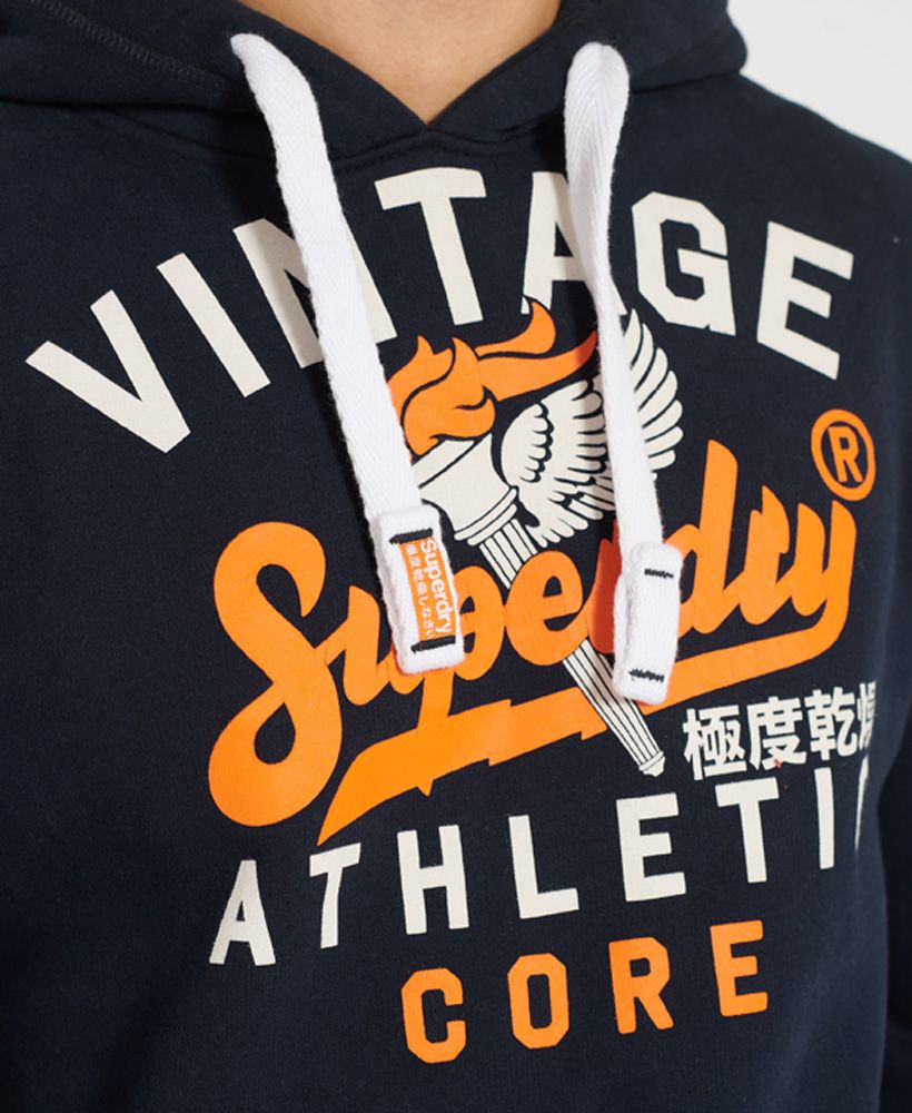 Designed with your comfort in mind, layer up in this fleece lined Athletic Core 54 Hoodie this season; made from a super-soft cotton blend.Drawstring hoodLong sleevesPouch pocketSoft liningRibbed collar, cuffs and hemCracked printed graphicSignature logo tab