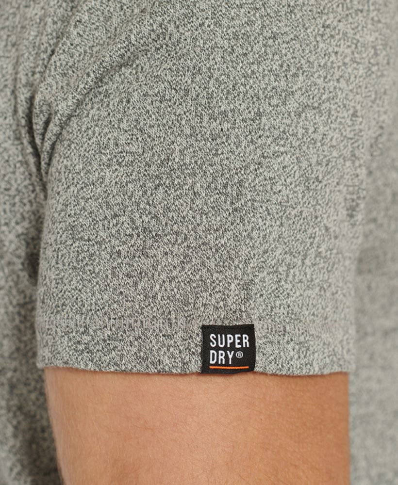 Superdry men's Surplus Goods classic pocket T-shirt. A lightweight T-shirt featuring a crew neck, short sleeves and a single patch pocket on the chest. Finished with Superdry branding on the pocket, a Superdry logo tab on one sleeve and on the side seam.Short sleevesTextured printed patch pocketLogo tab on side seam