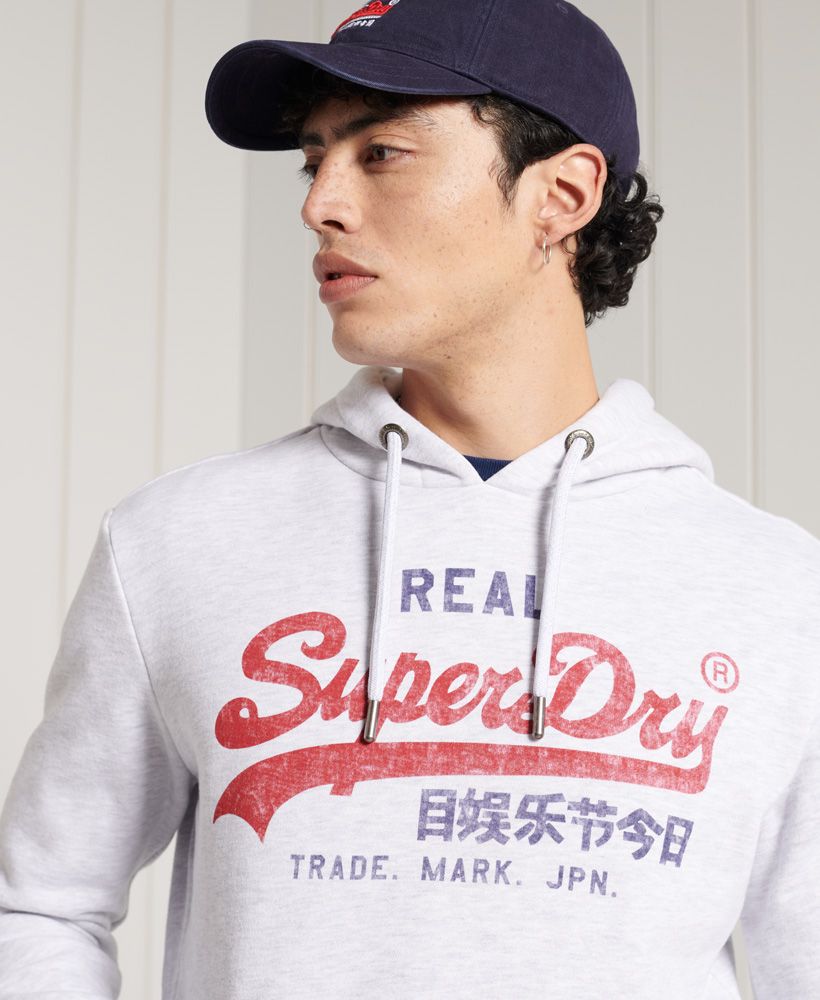 Nothing says iconic more than our Vintage Logo. Be part of our Superdry family with the Vintage Logo Premium Goods Brushed Hoodie.Long sleevesRibbed cuffs and hemDrawstring hoodFront pouch pocketPrinted logoFleece Lining