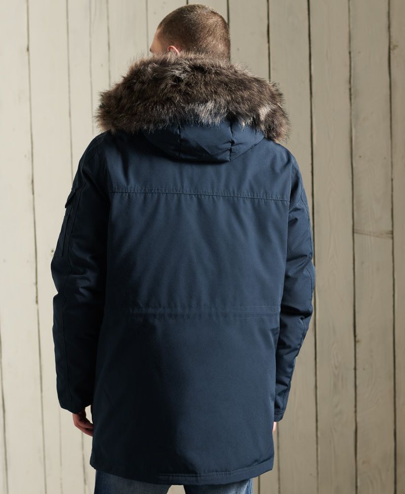 Just what you need to keep you warm and looking on trend this season. This Premium Down Parka Coat features a super warm down padding, a zip and popper fastening and a removable faux fur trim on the hood.Nine pocket designAdjustable Hood with removable faux fur trimZip and popper fasteningMulti-way zipsSignature logo badgeBungee cord adjustable waistSingle inner pocket90/10 Down fillingSuperdry is certified by the Responsible Down Standard (RDS) - all our down is sourced to ensure animal welfare.