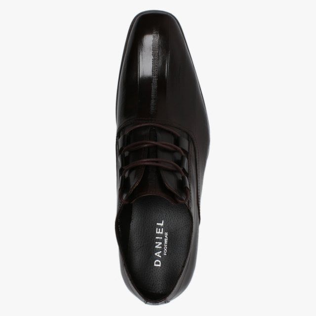 The Daniel Xenoblast Leather Loop Lace Up Shoes are part of the New Season collection. This smart style is crafted from a premium leather upper with part leather lining and rubber sole. The loop lace up upper provides an easy wear and ensures the perfect fit. Top stitching and raised seaming add detail to the upper as well as a textured design. Signature Daniel branding is seen on the foot-bed.