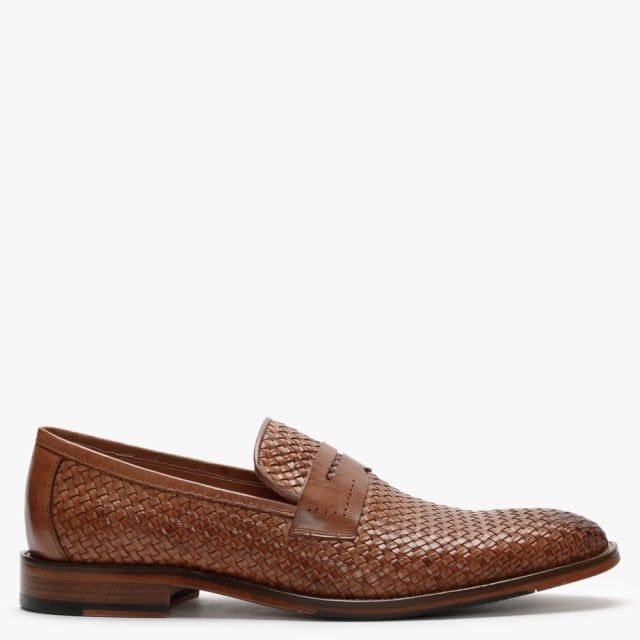The Daniel Mens Xingbang Leather Woven Loafers are part of the New Season collection. This everyday style is crafted from a premium leather upper in a classic woven design with luxurious leather lining. An easy to wear slip on style. Subtle top stitching and raised seaming add detail to the upper. Signature Daniel branding is seen on the foot-bed and sole.