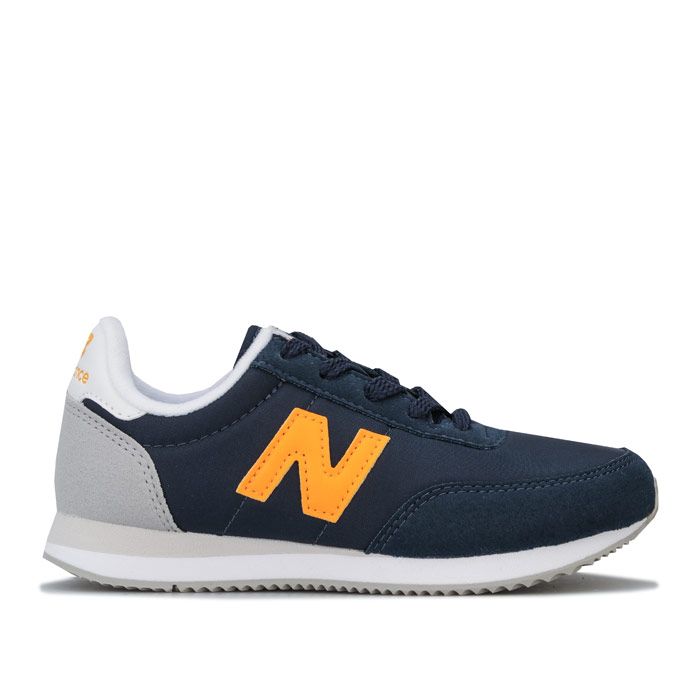 Children Boys New Balance 720 Trainers in navy - Yellow. – Nylon upper with synthetic suede overlays. – Lace up fastening. – Padded collar. – Contrast heel patch. – Comfortable textile lining. – Removable cushioned sockliner. – EVA foam midsole for lightweight cushioning. – New Balance branding at tongue side and heel. – Durable rubber outsole. – Textile upper – Textile lining – Synthetic sole. – Ref: YC720NBY