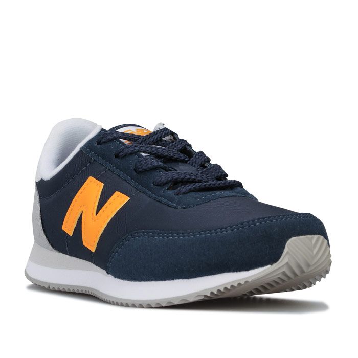 Junior Boys New Balance 720 Suede Trainers in navy - Yellow. – Nylon upper with synthetic suede overlays. – Lace up fastening. – Padded collar. – Contrast heel patch. – Comfortable textile lining. – Removable cushioned sockliner. – EVA foam midsole for lightweight cushioning. – New Balance branding at tongue side and heel. – Durable rubber outsole. – Textile Textile lining – Synthetic sole. – Ref: YC720NBY