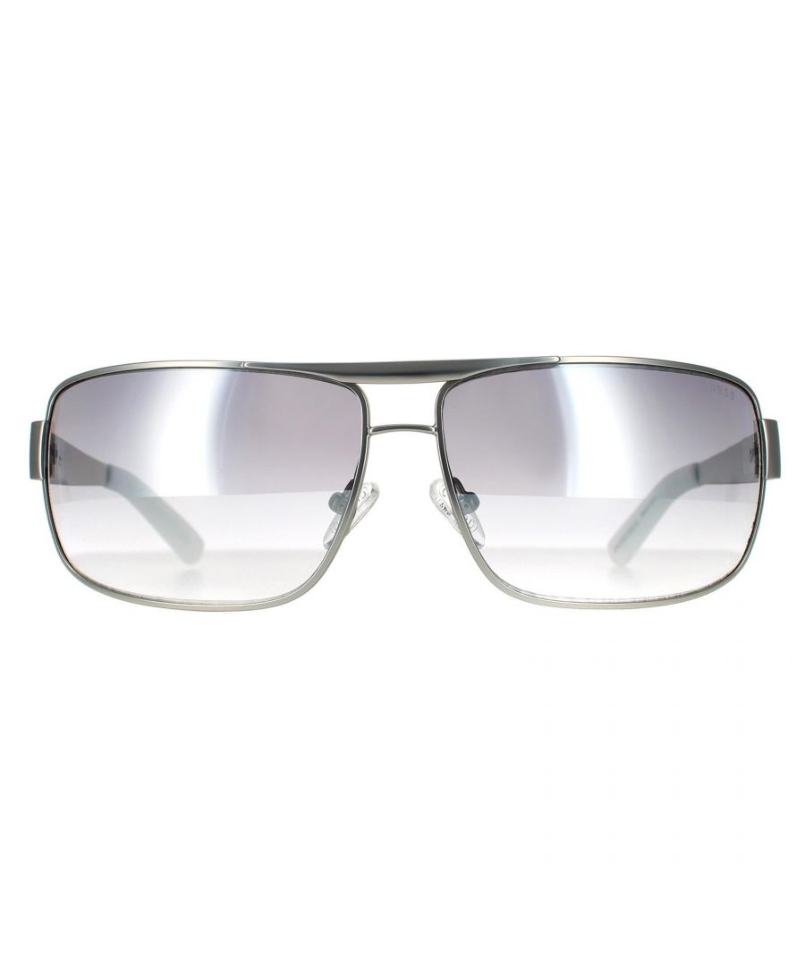 Guess Rectangle Mens Matte Light Nickeltin Smoke Mirror Sunglasses GU6954 are a sleek rectangle style crafted from lightweight metal. The top brow bar detail, adjustable nose pads and plastic temple tips ensure a secure fit. Guess's logo features on the slender temples for brand authenticity.