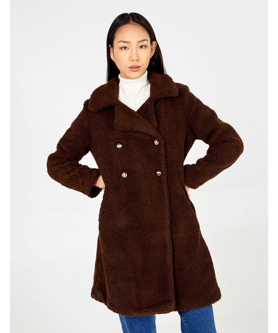 Combine cosiness and comfort in one ! This Double Breasted Teddy Coat is apt for the day and evening over anything .