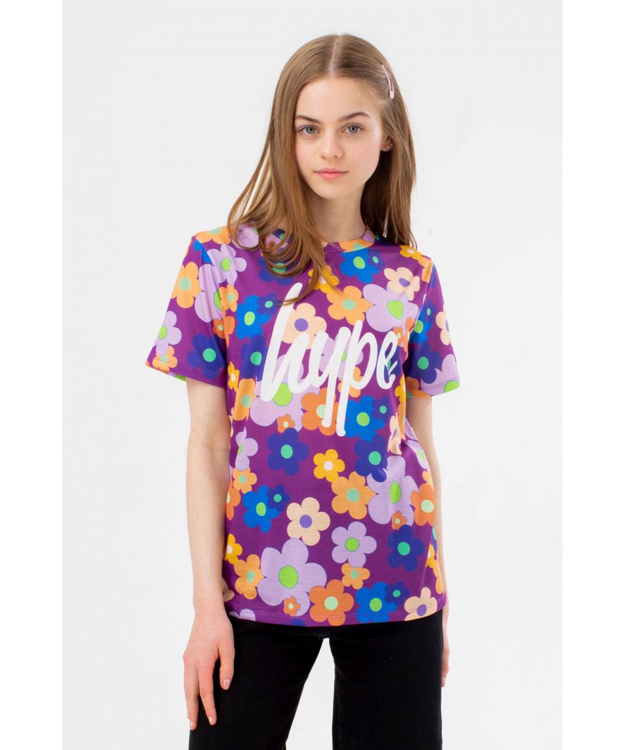 Make a statement in the HYPE. Girls Purple Flower Garden Script T-Shirt. Designed in our standard kids tee shape with a soft touch 95% polyester 5% elastane fabric blend in purple for the ultimate comfort. Boasting an all-over vibrant flower garden print, featuring the iconic HYPE. logo in contrasting white script, and finished with a crew neckline and short sleeves. Wear with jeans and jacket for a casual-smart fit or joggers for a casual look. Machine wash at 30 degrees.