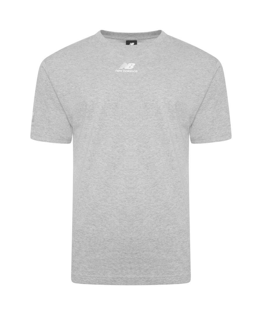 The New Balance Essentials Stack Pack Mens Short Sleeve T-Shirt incorporates a Flying NB logo printed up and down each sleeve to freshen up an athleisure staple. This shirt is also constructed of cotton jersey for comfort, and it features a relaxed fit that will keep you comfortable all day.   Short sleeves and crew neck with added Flying NB logo print to chest.