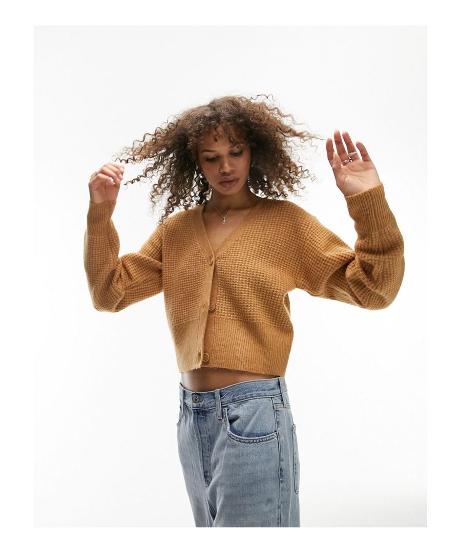 Jumpers & Cardigans by Topshop Tall Welcome to the next phase of Topshop V-neck Button placket Drop shoulders Relaxed fit  Sold By: Asos