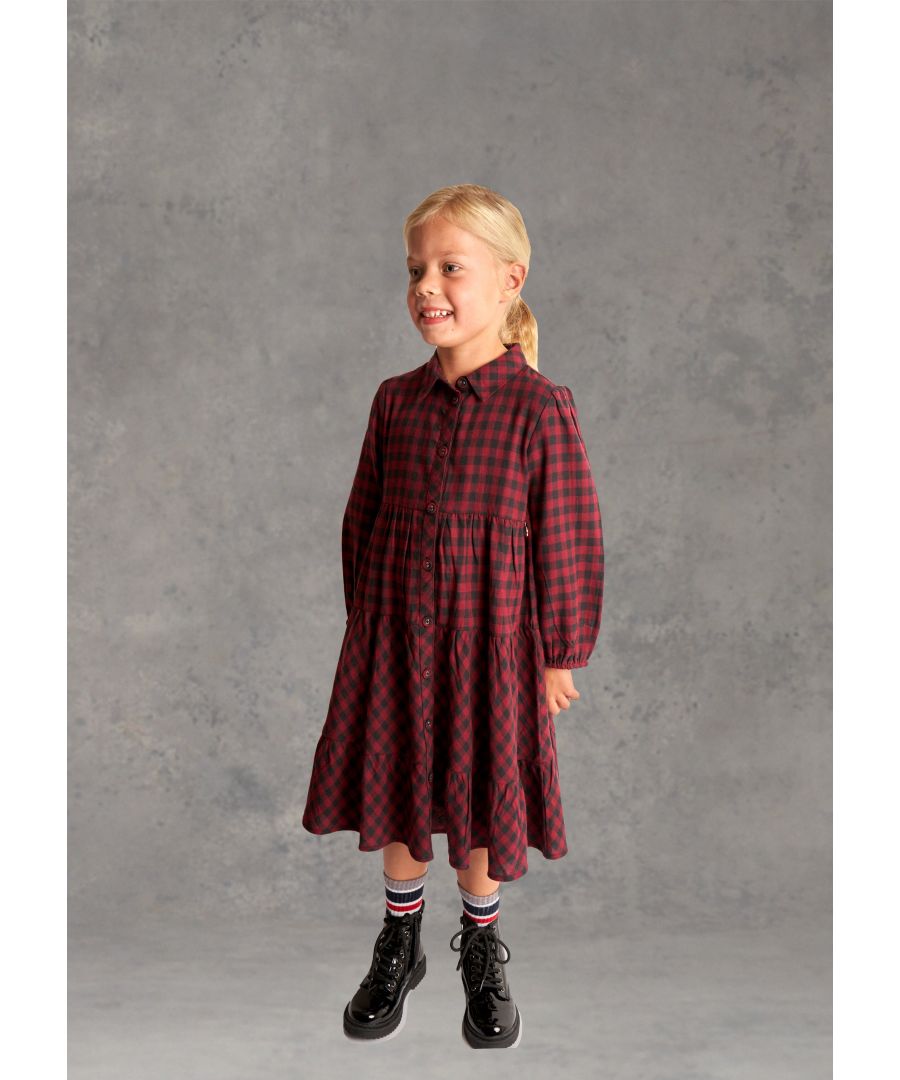Girls. Meet the shirt dress you’ll want to wear (absolutely) everywhere! Red and black gingham check  tiered with shirt collar and full button front fastening.   Angel & Rocket cares – made with fairtrade cotton   Crimson   About me: 100% cotton.   Look after me: think planet  machine wash at 30c
