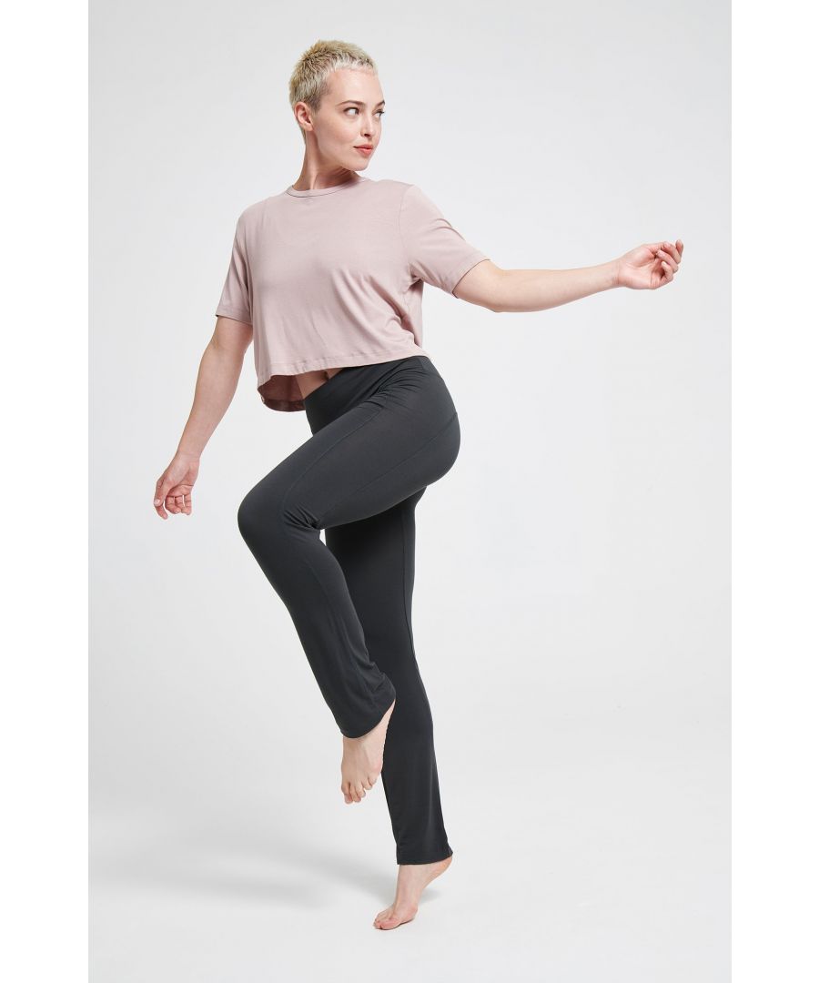 Our bestselling pants are practically perfect in every way. The classic slim leg cut is very flattering on your leg, plus we added hem and side seam details for fantastic bottom shaping. Made with Bambor®, you'll feel supported and so comfortable all day.\n\nDesigned for Yoga and Pilates \nMade with Bambor®, our unique blend of 60% Bamboo, 30% GOTS Organic Cotton, 10% Elastane\nElasticated double depth waistband\nFull length and 100% opaque\nAvailable in 3 leg lengths\nFlattering seam bottom sculpting detail\nSuper soft and comfortable\nNaturally sweat-wicking and breathable\nGreat for all sporting activities \n\nApprox Inside Leg Lengths:Regular Inside Leg Length: XS to XXL 82cm / 32€Also available in Short Length: XS to XXL 76cm / 30