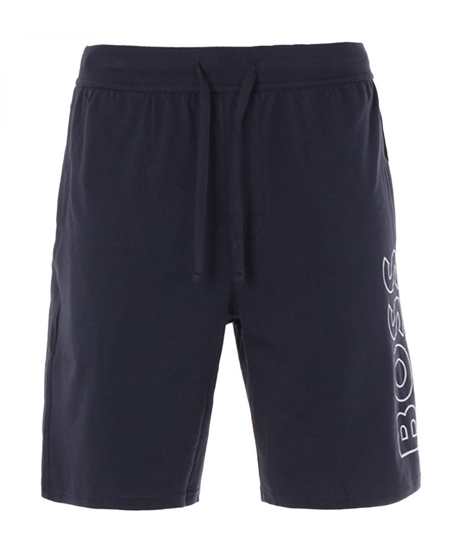 Refresh your sleepwear with the Identity Pyjama Shorts from BOSS. Perfect for downtime styling crafted from a super soft stretch cotton jersey, offering breathability and unmatched comfort. Featuring an elasticated drawstring waist and  side seam pockets. Finished with the brand new BOSS logo outline printed vertically down the left leg and the signature stripe pinch tag by the waist. Regular Fit, Stretch Cotton Jersey, Elasticated Drawstring Waist, Side Seam Pockets, BOSS Branding. Fit & Style: Regular Fit, Fits True to Size. Composition & Care: 95% Cotton, 5% Elastane, Machine Wash.