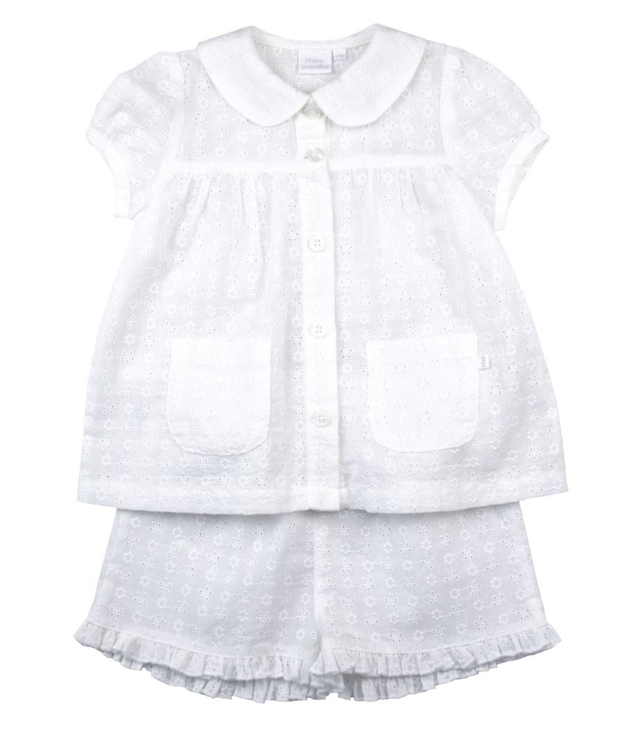 Our beautiful woven embroidery anglaise shortie pyjamas for girls are a lovely choice for Spring. This textured pure-cotton set has a button through top, which is beautifully detailed with a Peter-Pan collar, puff sleeves, engraved buttons and pockets, and woven shorts finished with a lovely frill hem. It makes a wonderful gift for little ones.\n\nDesign & Fit\n\nClassic white short sleeve top and shorts\nShort-sleeve button through top\nPeter Pan Collar\nElasticated waistband\nEasy, pull-on style\nFabric and Care\n\n100% Cotton \nMachine wash\nSafety warning: keep away from fire