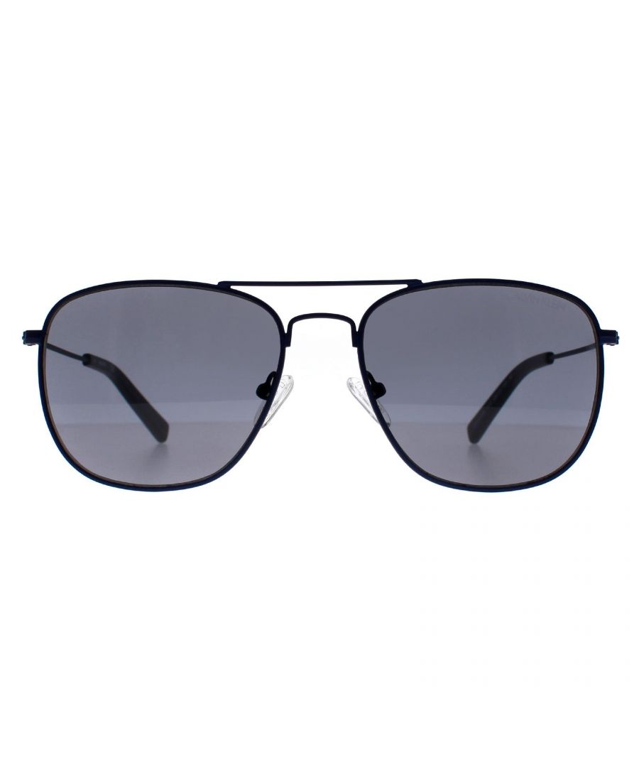 Calvin Klein Aviator Unisex Dark Blue Grey CK19132S  Sunglasses is crafted from high-quality metal, which is both lightweight and durable. The frame features a aviator shape with a double bridge, giving it a timeless and sophisticated look. The temples are adorned with the Calvin Klein logo, adding an extra touch of elegance to the design.