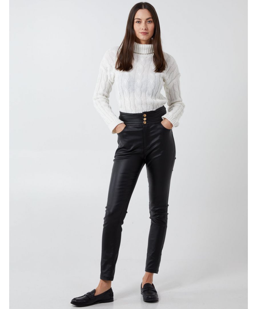 These trousers are the perfect addition to your AW collection. These fauxed leather trousers feel super comfy and look super trendy. Dress these up with a blouse, or dress them down with a casually white T shirt, the options yours!\nComposition: 70% Cotton, 25% Polyester, 5% Elastane. Machine washable. Approx. length 102 cm. Front button and zip fastened.