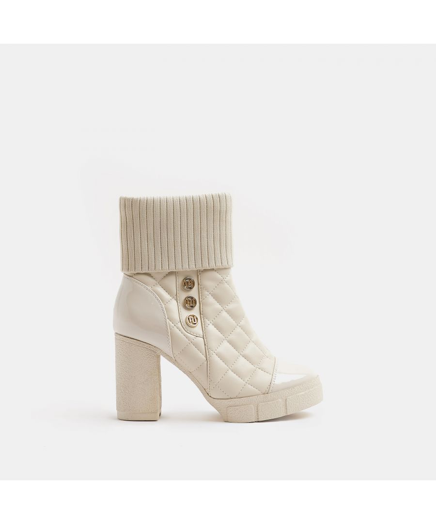 >Brand: River Island >Department: Women >Material Composition: Sole: Plastic, Upper: PU >Type: Boot >Style: Not specified >Occasion: Casual >Upper Material: PU >Heel Height: High (7.6-10 cm) >Season: Autumn||Winter