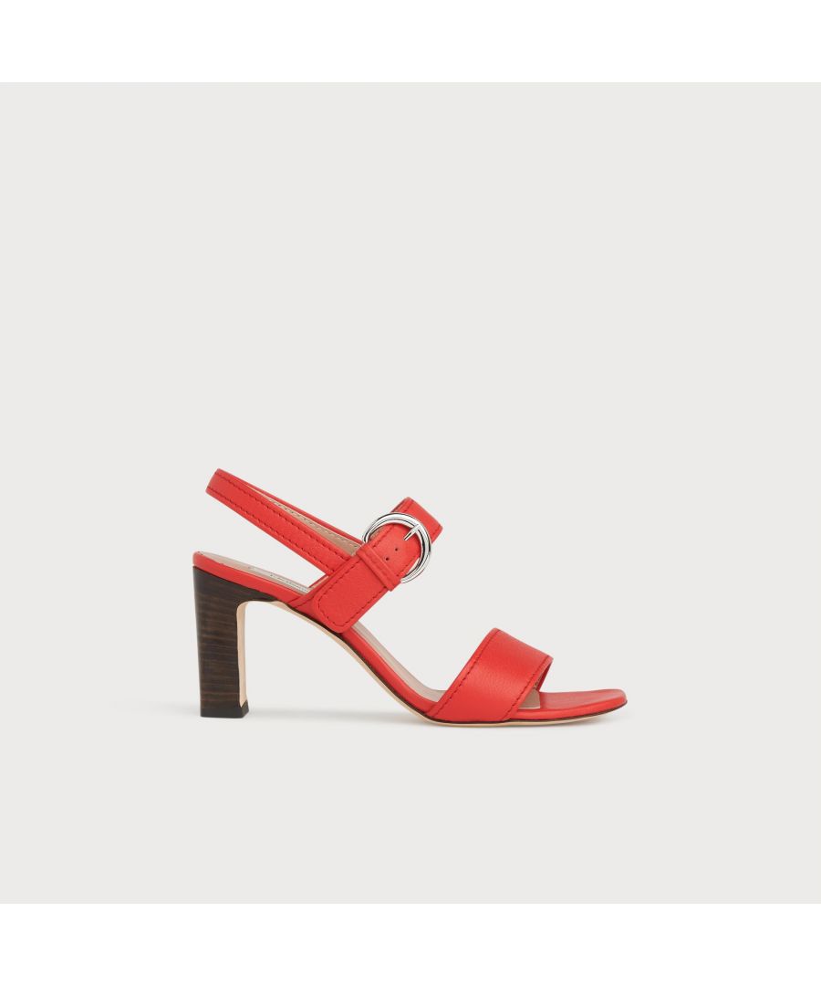 Sleek and stylish, our Natalie sandals are a new style for SS20. Crafted in Italy from grainy red leather, they have a double-strap design with statement buckle detail, a back strap and a wooden stacked 80mm block heel for added comfort. Wear them with summer skirts and dresses when you need some height.