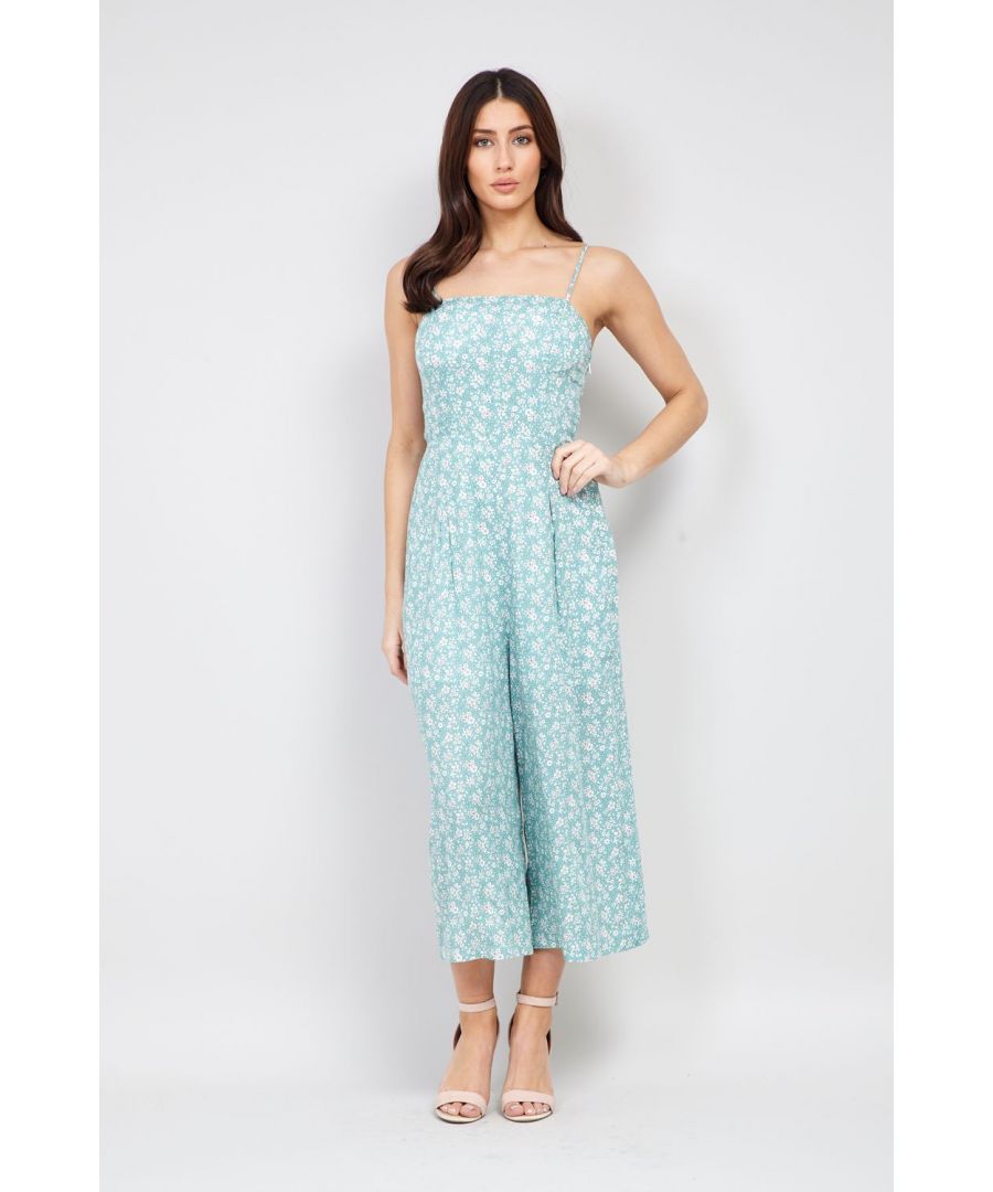 A super cute ditsy floral jumpsuit which is perfect for the hotter months. It has cami straps, a square neck and wide cropped legs. Wear with nude strappy heels. and a clutch for a night out.
