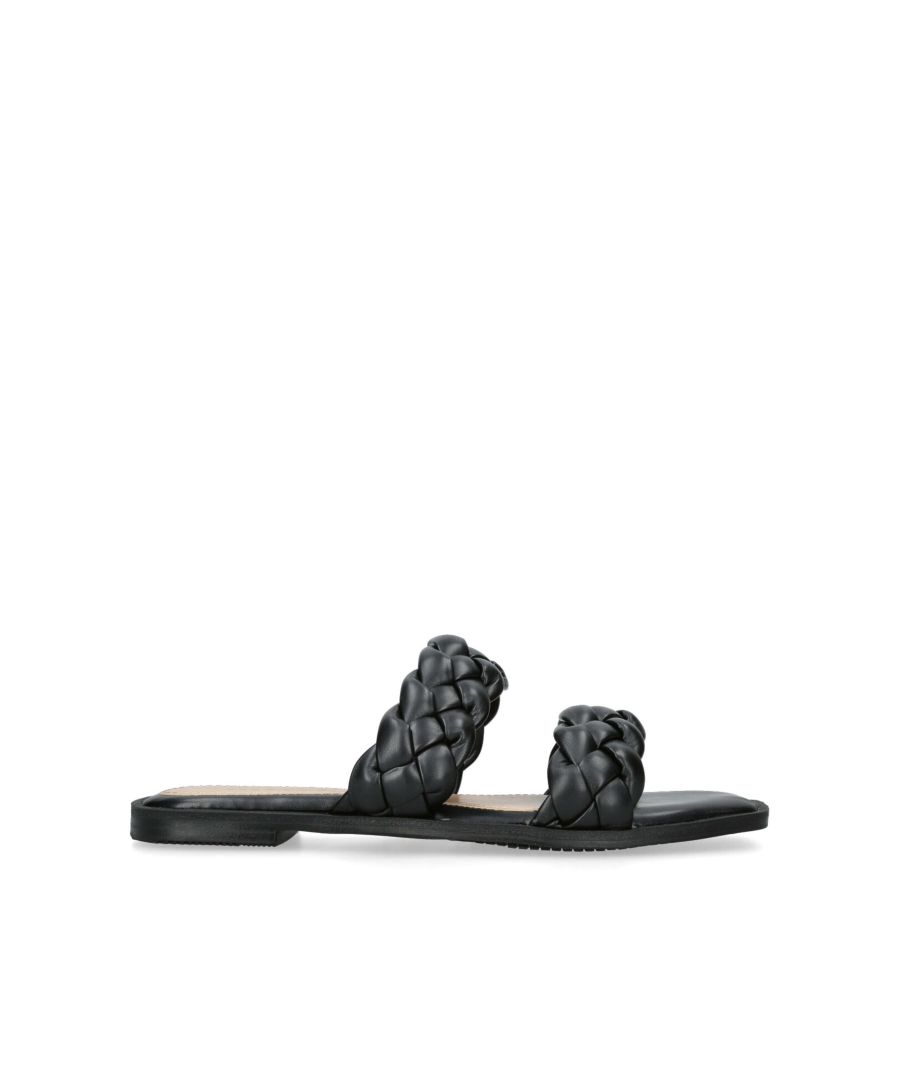 The Pauli from Miss KG is a flat sandal with two braided straps across the foot. The footbed is padded for comfort.