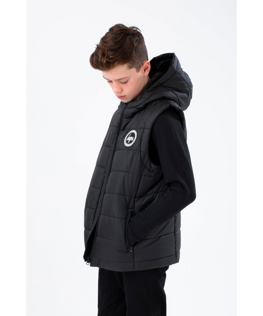 Meet the HYPE. Kids Black Padded Puffer Gilet, part of the HYPE. 2022 Back to School collection. Perfect for those warmer days when your mum says you still need to wear a jacket, the gilet features padding to keep you cosy, a full front zip, and the iconic HYPE. logo. Machine wash at 30 degrees.