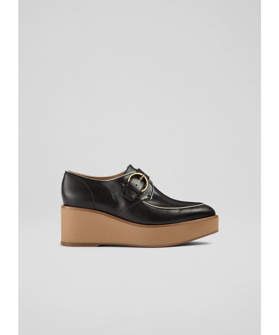 A contemporary take on a classic shoe, our Drew monk shoes offer a little height thanks to their wedge sole. Crafted in Spain from beautiful black nappa leather, they have an almond-shaped toe, contrast ecru piping detail, a round buckle and a crepe wedge platform sole. Wear them with tailored trousers as a modern alternative to a lace-up or loafer.