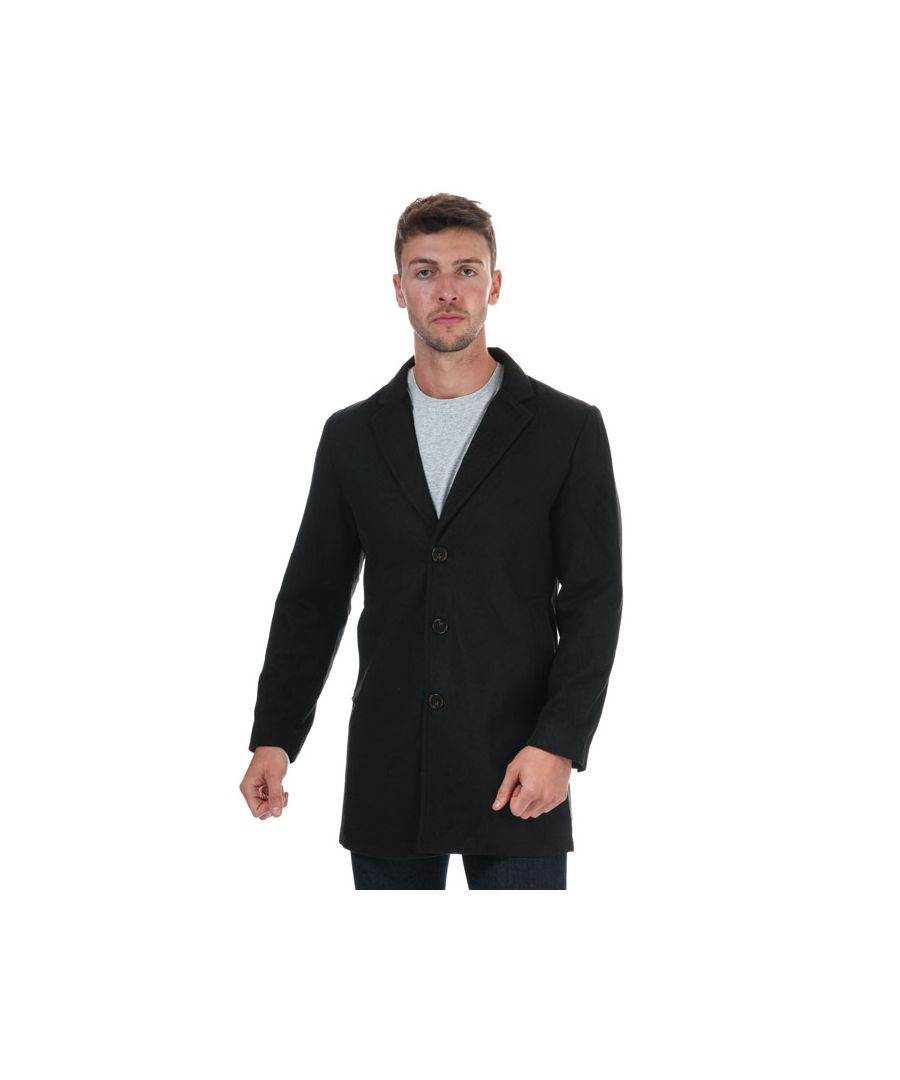 Mens Original Penguin Faux Wool Peacoat Jacket in black.- Lapel collar.- Long sleeved.- Button front closure.- Double breasted.- Side pockets.- Regular fit.- Shell: 100% Polyester. Lining: 100% Polyester. Machine washable. - Ref: 124681706B
