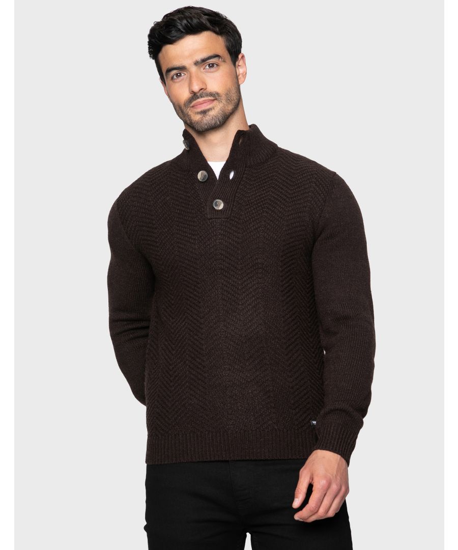 This medium weight, textured knit jumper from Threadbare features a button up, ribbed funnel neck collar with ribbed cuffs and hem. Made in a soft yarn for comfort, this is a great piece to keep you warm this season. Other colours available.
