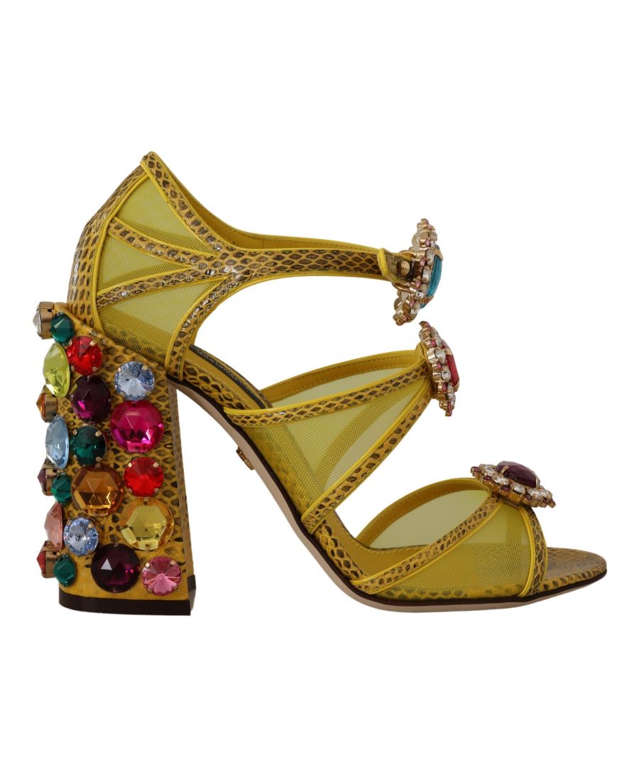 DOLCE & GABBANA\nGorgeous brand new with tags, 100% Authentic yellow leather crystal sandals.\nModel: Block Heels Sandals\nColor: Yellow with multicolor crystals\nLeather bottom sole\nLogo details\nMade in Italy\nVery exclusive and high craftsmanship\nMaterial: 16% PA, 16% Leather, 68% Ayers
