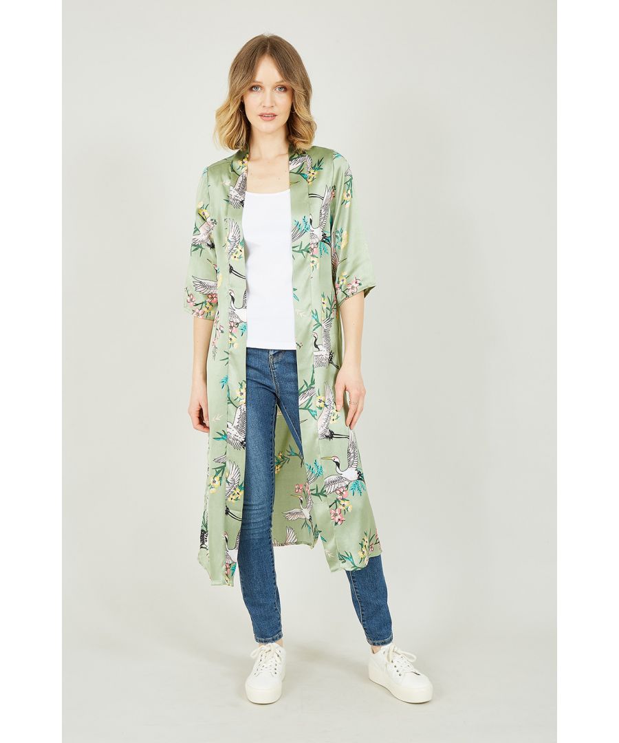 Turn heads in this Yumi Khaki Crane Print Long Kimono. Featuring an extra long cut, statement edges and a myriad of complimentary, adventurous patterns, this kimono is truly a regal affair. Crafted from lightweight, breathable Rayon, allowing you to play with layering on the warmest of days. The styling possibilities are endless, but we love it layered over a jumpsuit and matched with strappy heels. Throw on and feel like a queen.