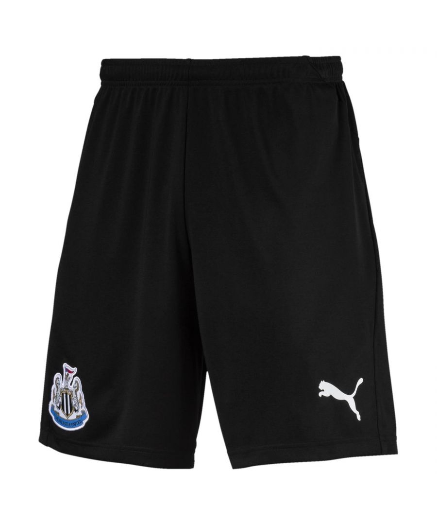 Puma Newcastle United FC Training Shorts Mens - These Puma Newcastle United FC Training Shorts are crafted with an elasticated waistband and drawstring fastening for a secure fit. They feature flat lock seams to prevent chafing and are a lightweight construction. These shorts are designed with a team badge and are complete with Puma branding.