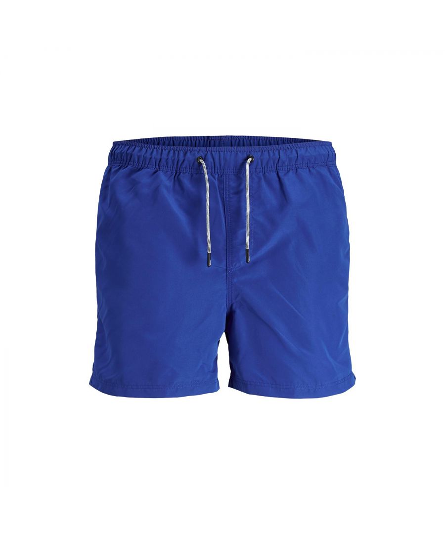 Jack & Jones men's classic swim shorts feature an elasticated waistband, a single pocket on the back, and a drawstring fastening, Also features front slit pockets. Show off your sporty side with these swim shorts. These shorts are made of 100% polyester, The shorts will dry quickly & are very comfortable.\n\nFeatures:\nSwim shorts with elastic waist\nMade from 100% polyester\nSide pockets and single back pocket\nLightweight and quick-drying\nFixed cotton drawstrings with secured free ends\n\nWashing Instructions:\nMachine wash at max 30°C under gentle wash programme\nDo not bleach\nTumble dry on medium heat settings\nIron on low heat settings\nDo not dry clean\nHang dry\n\nPackage Includes: Jack & Jones Men's Swim Shorts