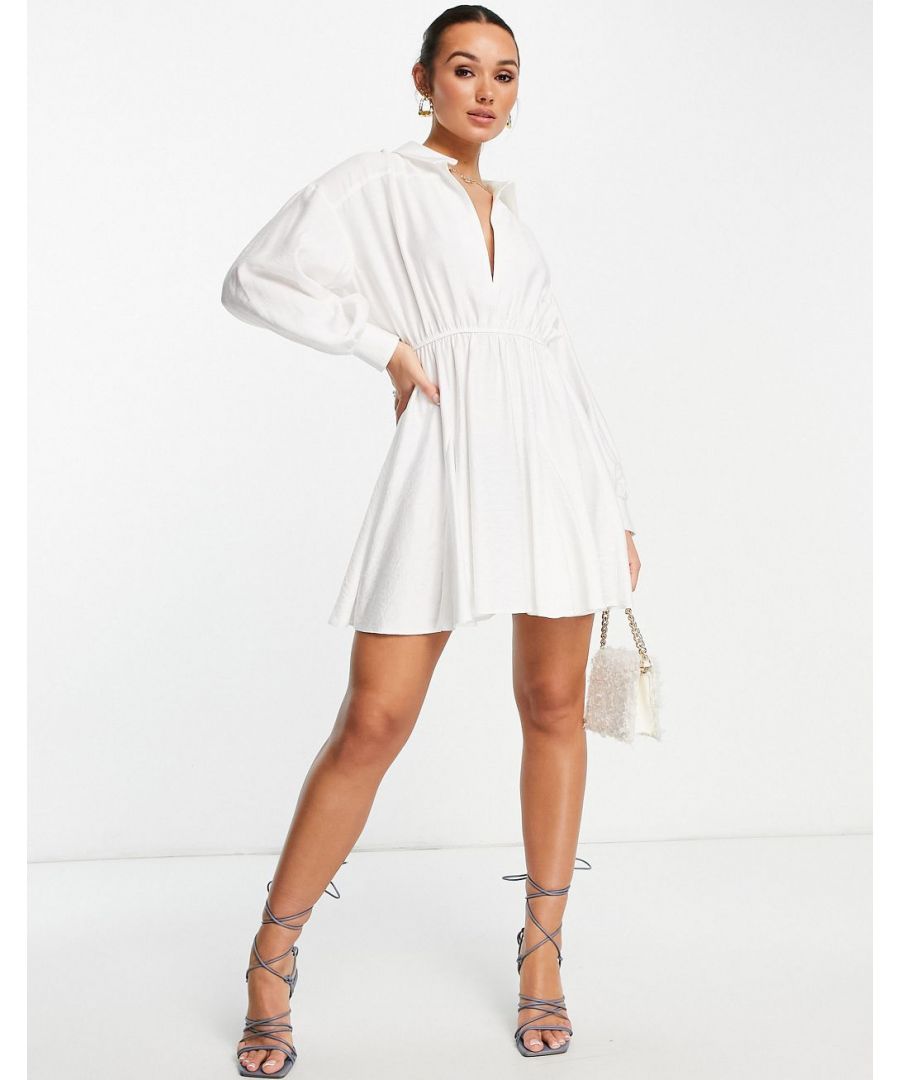 Mini dress by ASOS DESIGN Love at first scroll Spread collar Plunge neck Elasticated waist Regular fit Sold by Asos