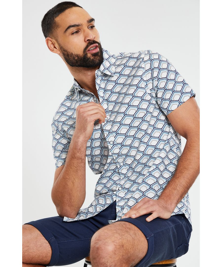 This short sleeve, geometric print shirt from Threadbare is made in a cotton fabric and designed in a regular fit. A must have style for every wardrobe this season. Team with shorts or chinos to complete the look. Other colours available.