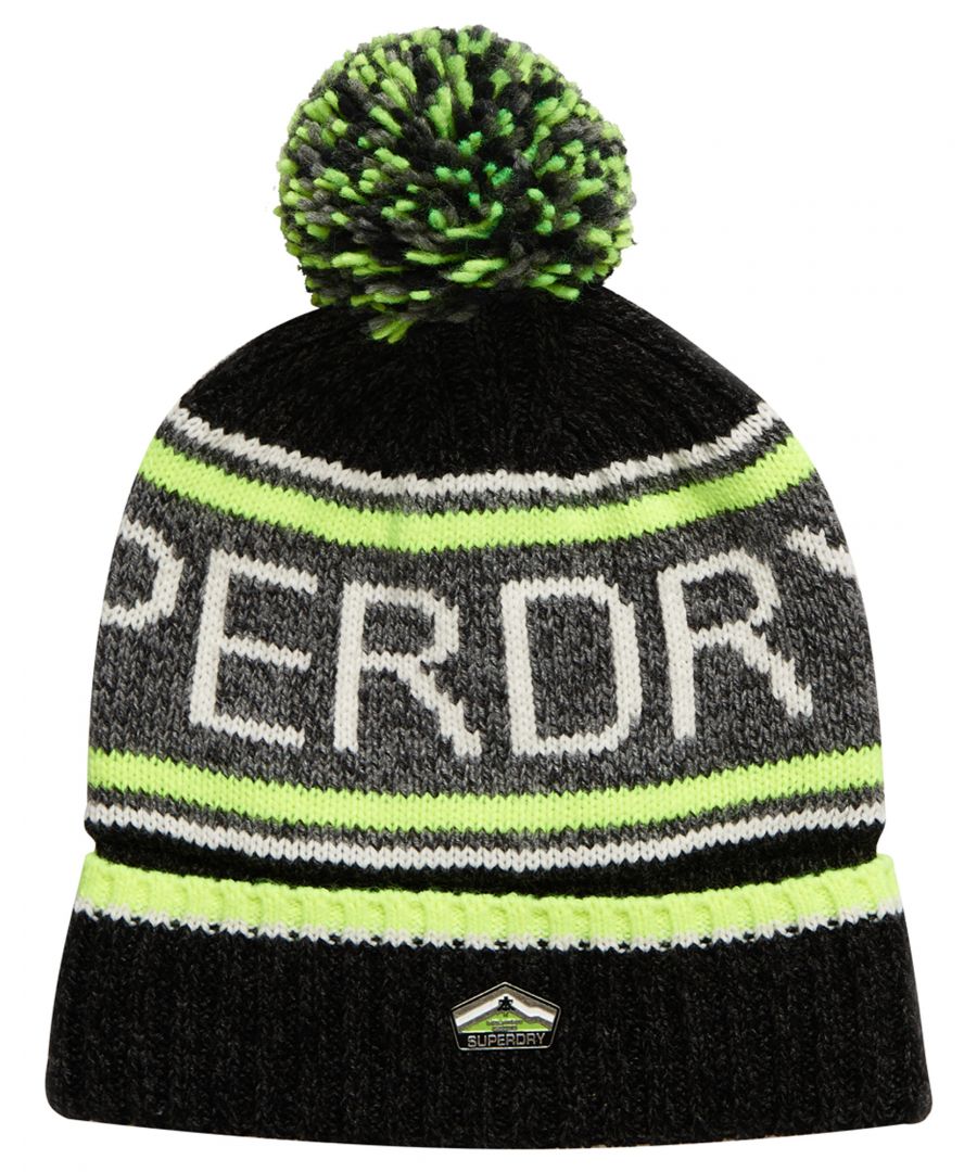 Superdry men's Superdry Logo beanie. Featuring a bobble top, metal Superdry badge and branding. This turn up beanie is perfect for the colder weather.