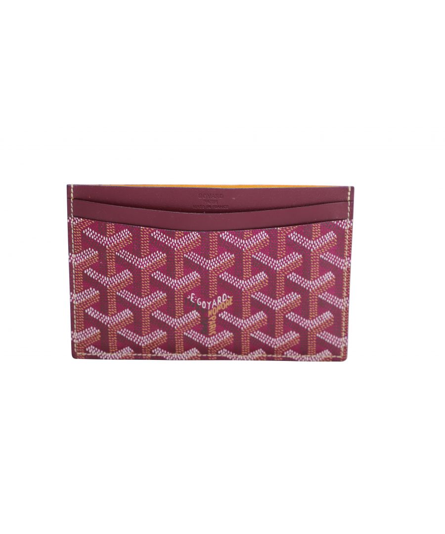 VINTAGE, RRP AS NEW\nMade with style and function, this Saint Sulpice cardholder from Goyard is a must-have to store your cards. Crafted from signature Goyardine coated canvas in burgundy, this cardholder is designed with multiple card slots, brand's logo on the front top, and leather lining. Includes a box and cleaning fabric.\n\nGoyard Saint Sulpice Classic Multi-slot Cardholder in Burgundy Canvas\nCondition: excellent\nColor: Burgundy\nMaterial: Canvas\nSign of wear: No\nSKU: 99718   \nSize: one size\nDimensions: Length:   150 Height:   100