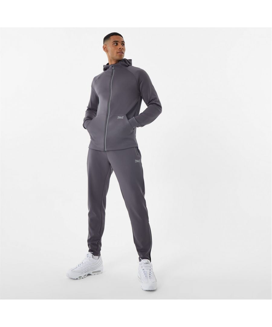 Everlast Track Joggers - All the gains and none of the pain, feel comfortable and chilled out in the Everlast track joggers. Made from a sweat wicking fabric and super-soft fibres, the joggers feature a reflective design to keep you seen when visibility is limited. Complete with a detail at calf, zip at cuff, slim fit and tapered style.  >Tapered fit  >Everdri fabric  >Interlock training fabric  >Super lightweight  >New style: Reflective details  >Plain style: 91.6% Polyester, 8.4%% Elastane  >Textured marl: 91% Polyester, 9% Elastane  >Machine washable