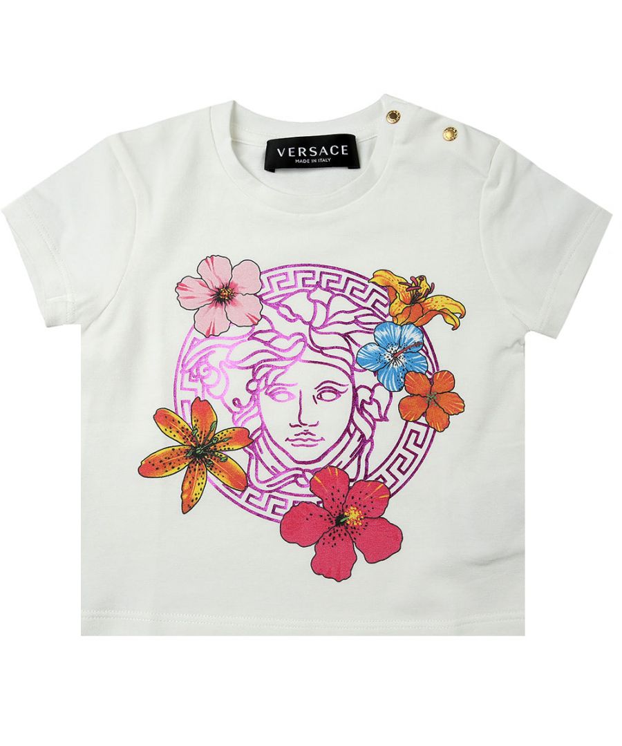 This Versace Baby Girls T-shirt is crafted from cotton and features a round collar, short sleeves, a button closure on the shoulder and the Medusa logo on the front.\n\nButton closure\nMedusa Logo\nRound collar\nWhite