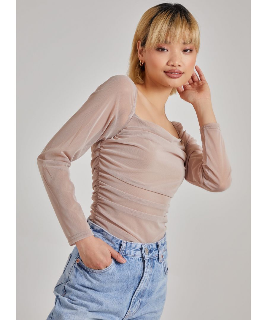 Your weekend outfit is sorted! Get ready to go out-out in this flattering Long Sleeve Mesh Bodysuit. 95% Polyester, 5% ElastaneMade in the UKWash With Similar ColoursIron On ReverseDo Not Dry CleanModel wearing size 8Model height: 5'9