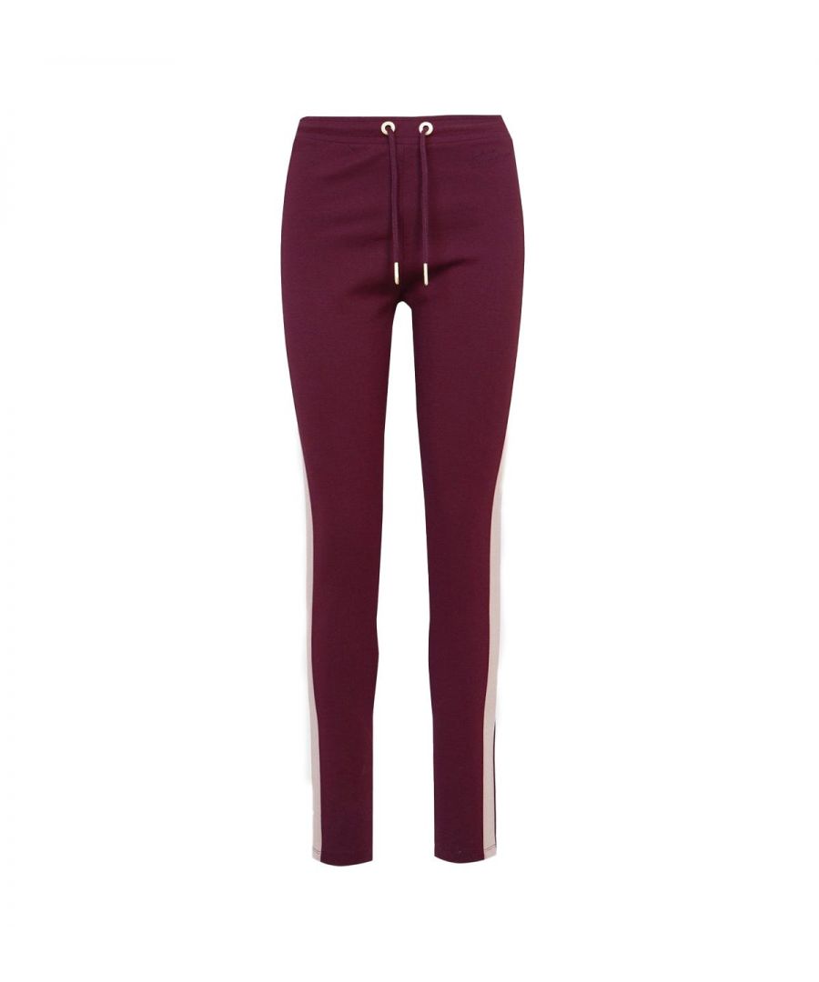 Elevate your casual days with the Women's Montegi Joggers from Barbour International, inspired by their signature track pants with updated detailing, perfect for creating a stylish relaxed look. Crafted from a stretch cotton-modal blend offering comfortable all-day wear and a super soft feel. Featuring a drawstring waist, stylish contrasting side panels and script embroidery at the hip. Finished with the iconic Barbour International logo on the back. Slim Fit, Stretch Cotton-Modal Blend, Drawstring Waist, Contrasting Side Panels, Barbour International Branding. Style & Fit: Regular Fit, Fits True to Size. Composition & Care: 35% Cotton, 35% Modal, 26% Polyamide, 4% Elastane, Machine Wash.