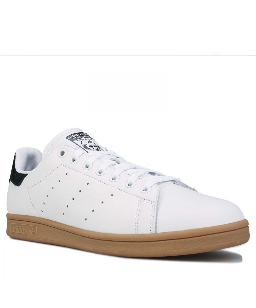 Mens adidas Originals Stan Smith ADV Trainers in white black.- Premium leather upper.- Lace fastening.- Round toe.- Contrast heel patch with Trefoil branding.- Perforated 3-Stripes to sides.- Tonal print Stan Smith logo to tongue. - Regular fit. - Rubber outsole.- Leather upper  Leather and textile lining  Synthetic sole.- Ref.: FV5941