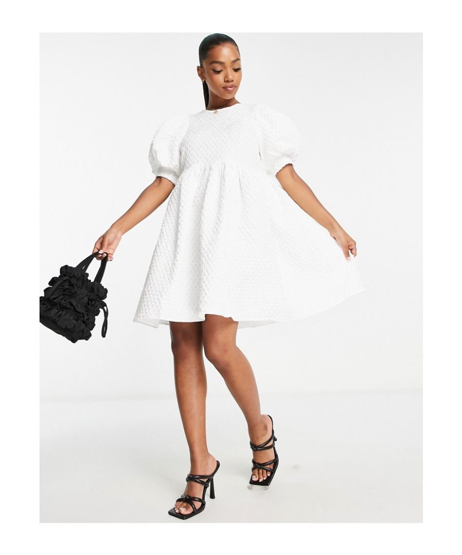 Mini dress by PIECES All dressed up Crew neck Puff sleeves Button-back fastening Regular fit Sold by Asos